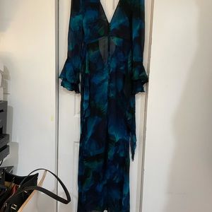 Exude modern drama in the Fiorella.
New with tags XXS 
NEVER WORN.